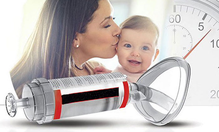 Shows a woman and her baby with a clock in the background and a de-choking device in the foreground
