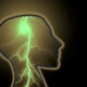Shows the side profile of a human head with a bolt of lightning in the center of it.