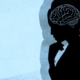 Shows the silhouette of a depressed woman on a blue background with what appears to be a sugar cube and her brain is highlighted